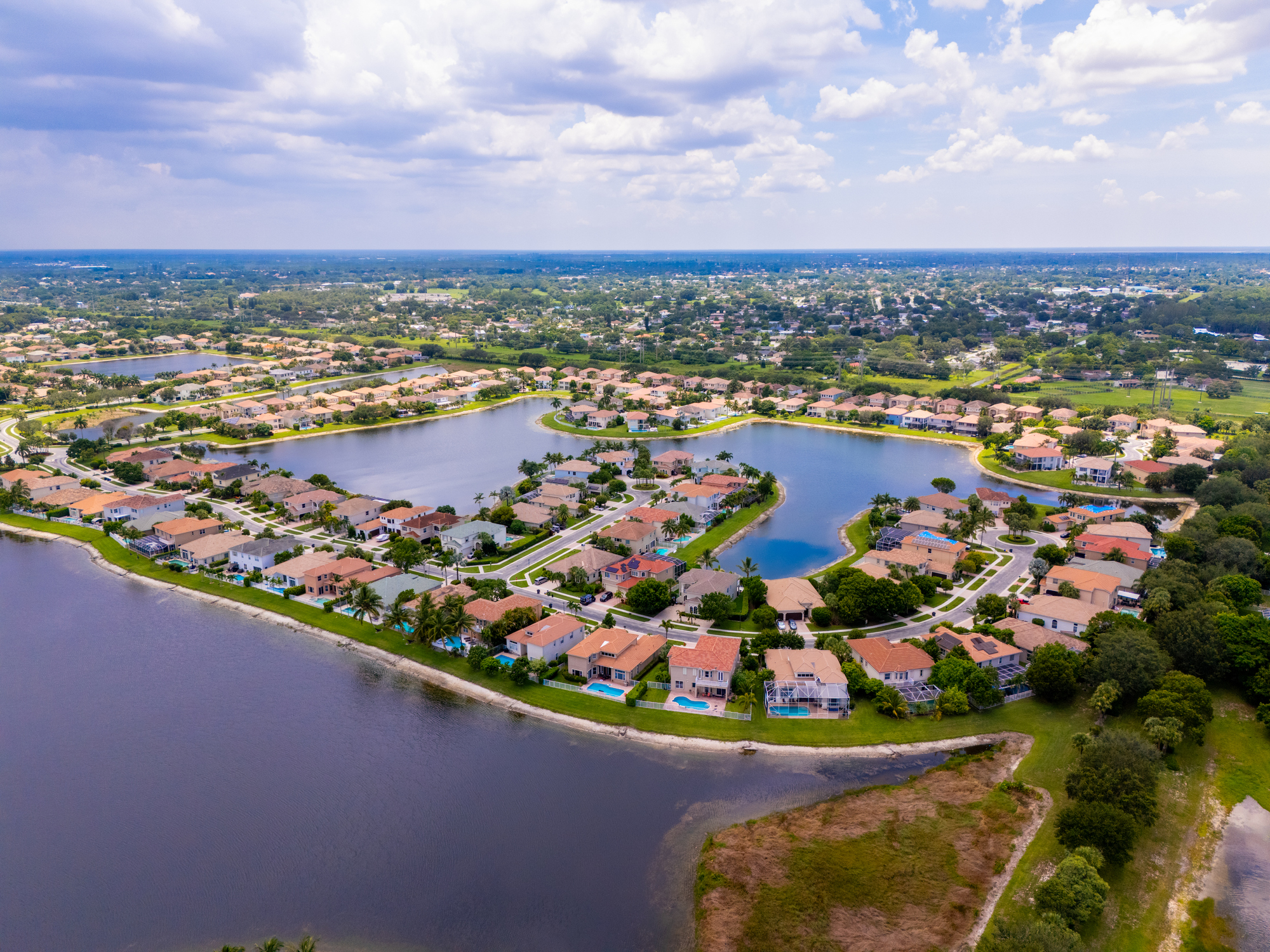 Aerial view of residential homes and lakes in Wellington, Florida